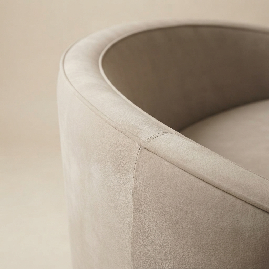 A close photograph of the joinery on Velvet Curved Sofa